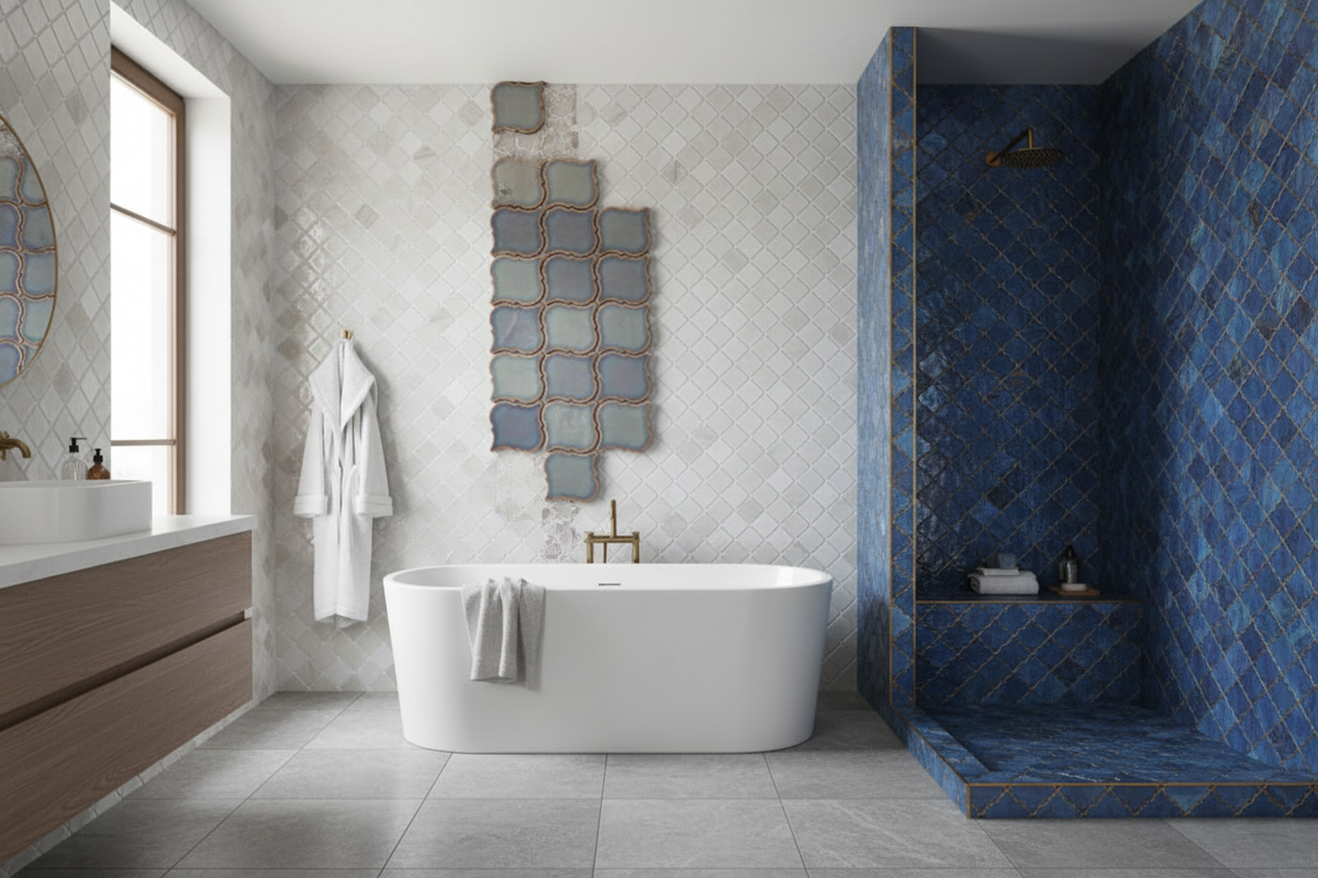 Luxury mosaic tile collection featuring white pearl glass, blue marbled glass, and grey arabesque tiles with gold edges in an elegant showroom interior